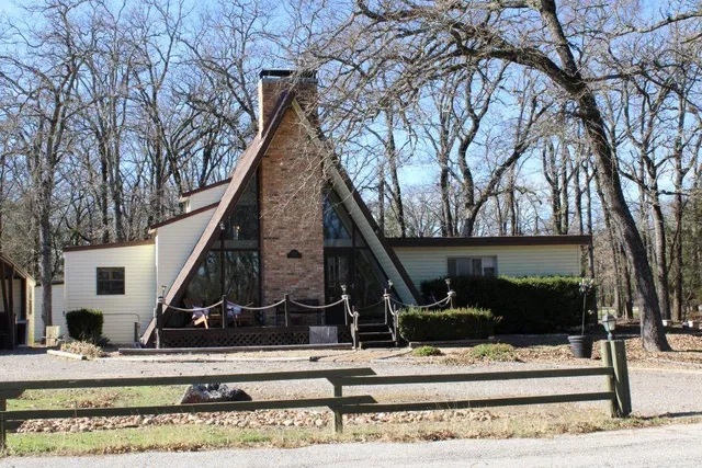 a view of a house with a park