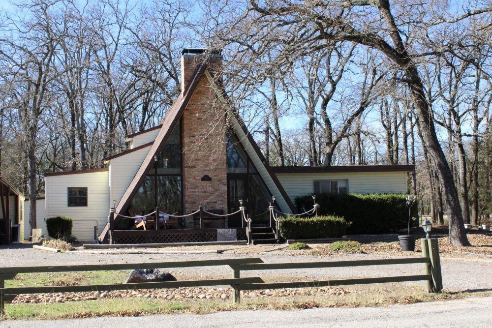 a view of a house with a park