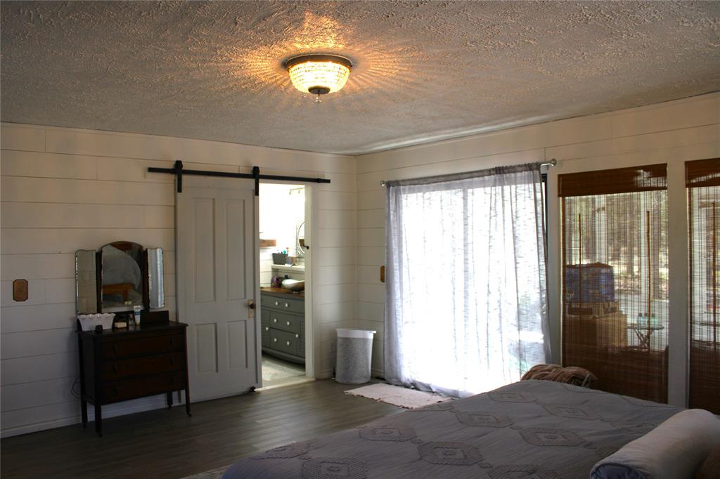 2629 Fox Point Road Quinlan, TX 75474 - Photo 15 of 30 a view of a room with gym equipment