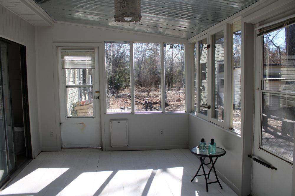 2629 Fox Point Road Quinlan, TX 75474 - Photo 18 of 30 a room with window and furniture