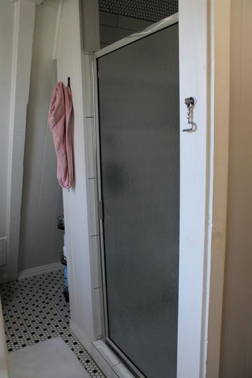 2629 Fox Point Road Quinlan, TX 75474 - Photo 23 of 30 a bathroom with a shower and a toilet