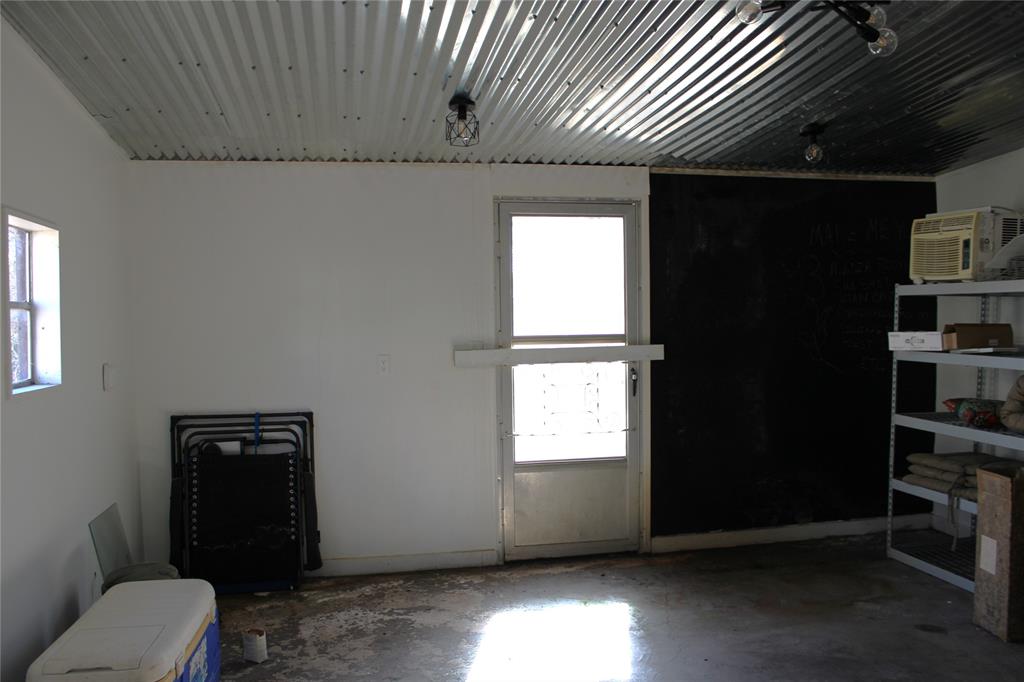 2629 Fox Point Road Quinlan, TX 75474 - Photo 25 of 30 a view of an empty room with a window