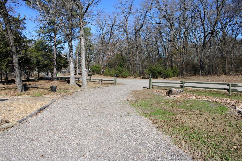 2629 Fox Point Road Quinlan, TX 75474 - Photo 26 of 30 a view of park with large trees and playing area