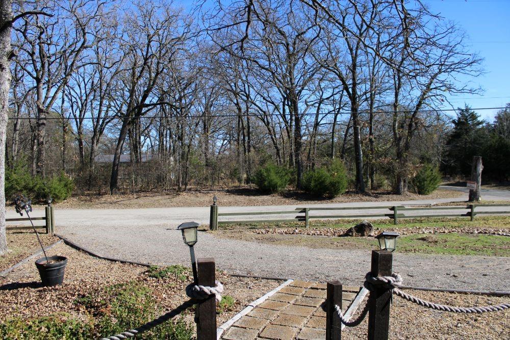 2629 Fox Point Road Quinlan, TX 75474 - Photo 27 of 30 a view of a swimming pool with a patio