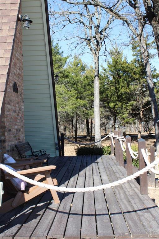 2629 Fox Point Road Quinlan, TX 75474 - Photo 4 of 30 a view of swimming pool with a lounge chairs