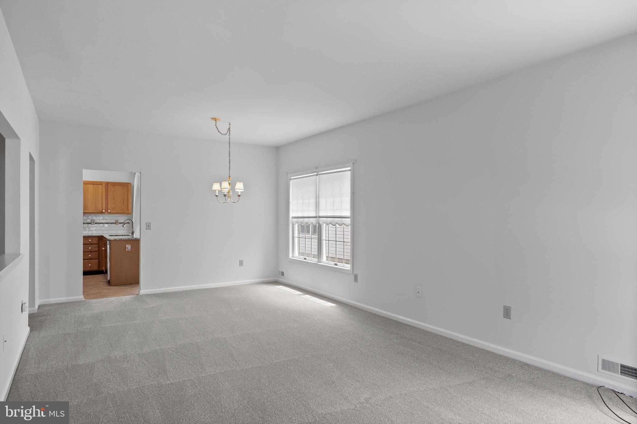 7 Covered Bridge Circle Columbus, NJ 08022 - Photo 9 of 40 a view of an empty room with a window