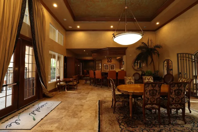 a group of people sitting outside of a building