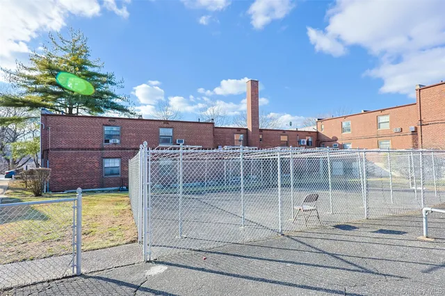 a view of a balcony with a potted plants