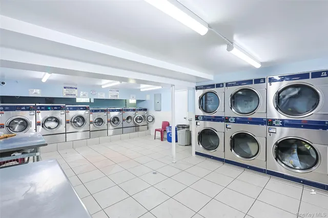 a utility room with dryer washer and dryer