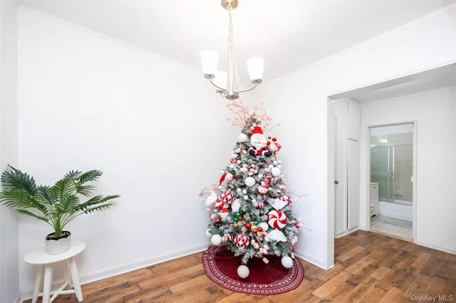 a view of a dining room with a chandelier