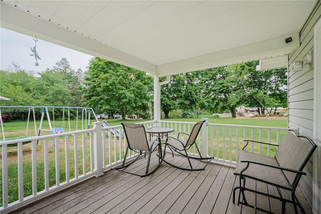 765 Main Street Rimersburg, PA 16248 - Photo 23 of 30 a view of a chairs and table on the wooden deck