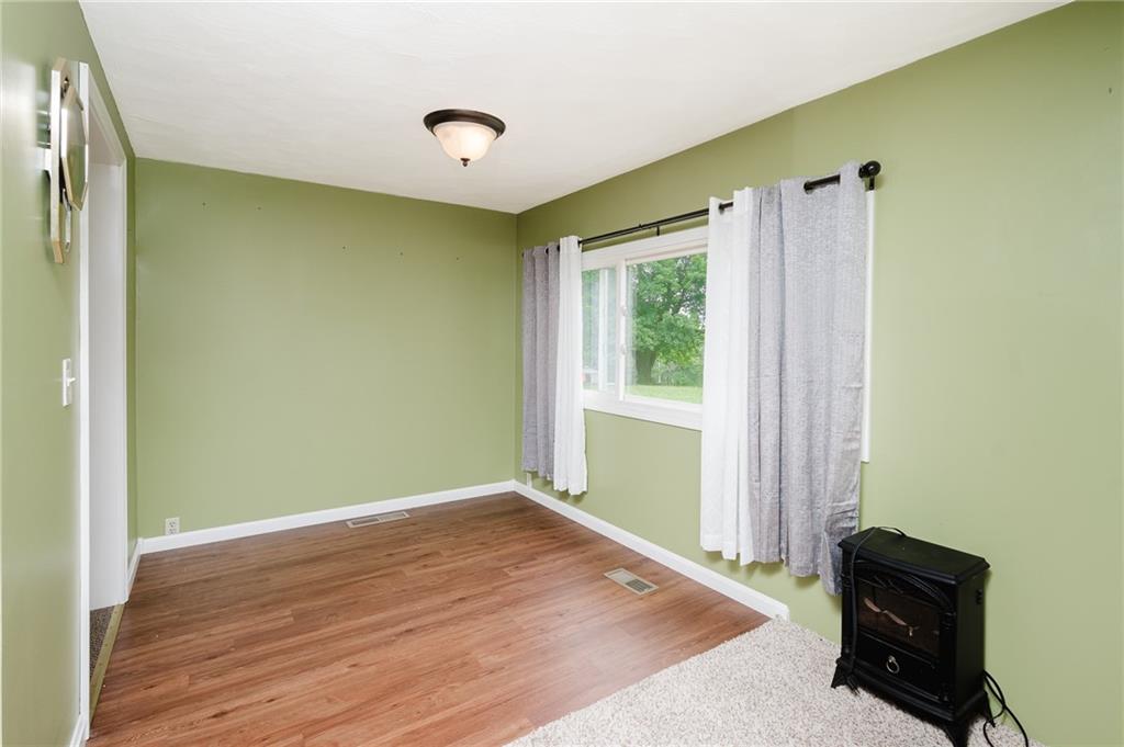 765 Main Street Rimersburg, PA 16248 - Photo 7 of 30 a view of empty room with wooden floor and fan