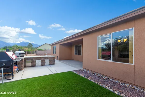 a house view with a outdoor space