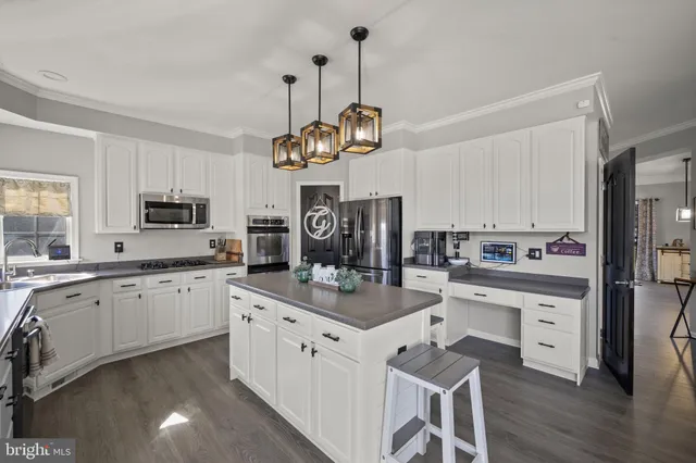 a bedroom with a bed closet and flat screen tv