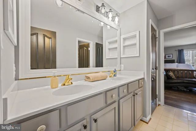 a view of a balcony with wooden floor and fence