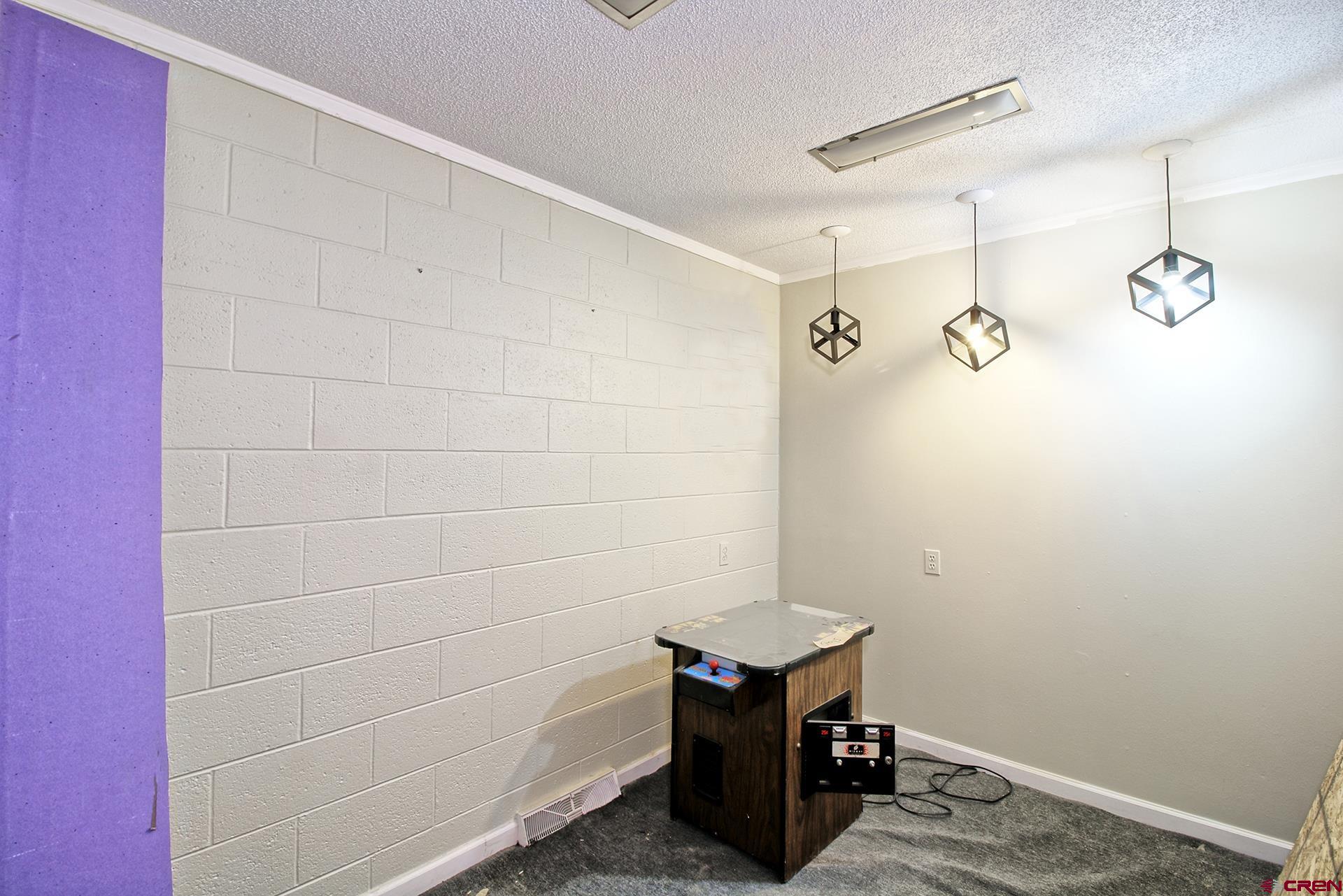 823 Main Street Delta, CO 81416 - Photo 26 of 32 a bathroom with a shower