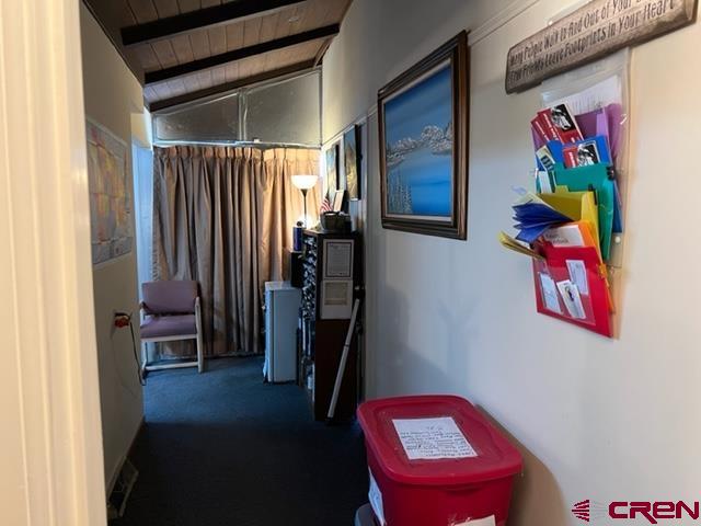 823 Main Street Delta, CO 81416 - Photo 32 of 32 a view of a hallway with workspace and livingroom view