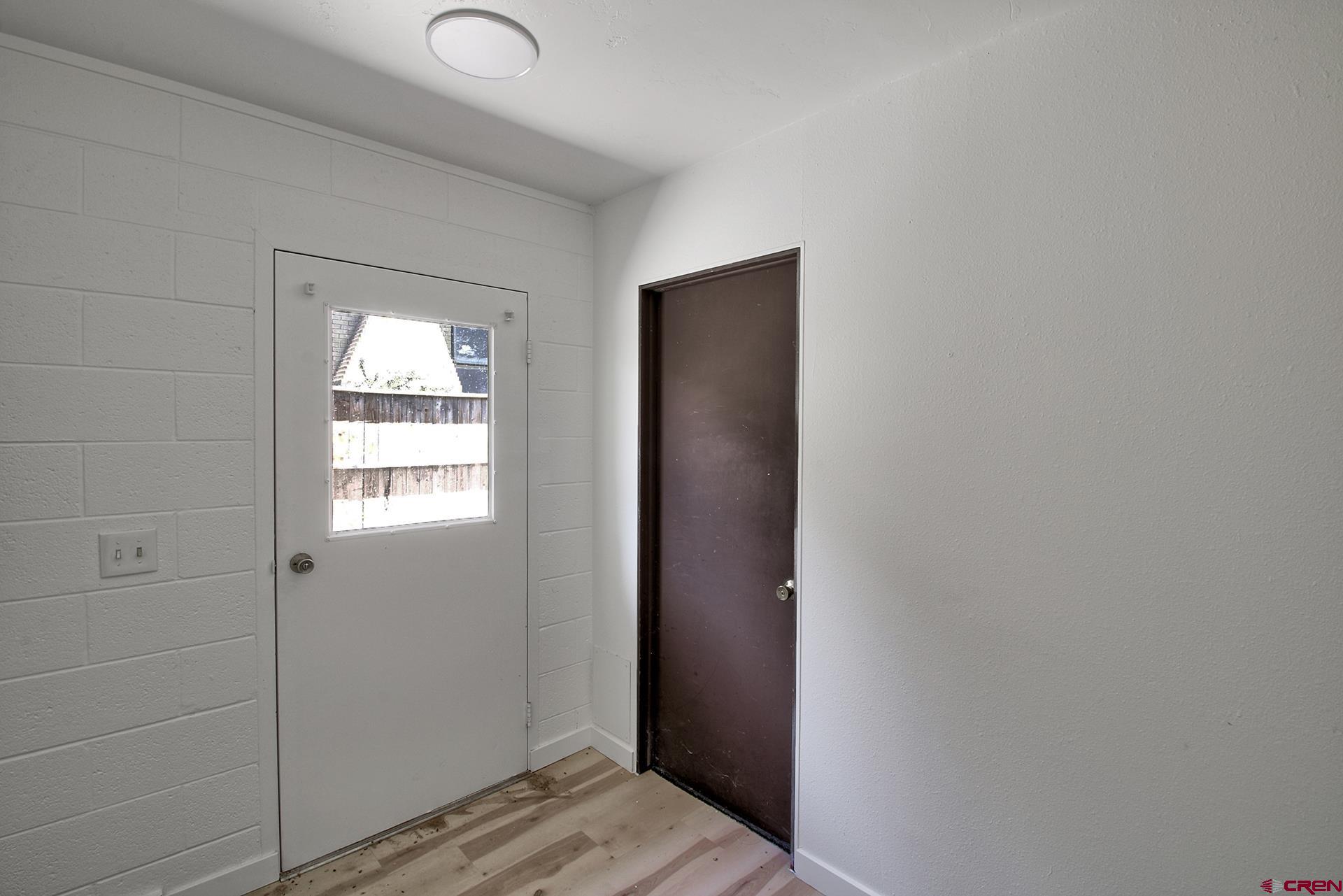 823 Main Street Delta, CO 81416 - Photo 8 of 32 a view of wooden floor