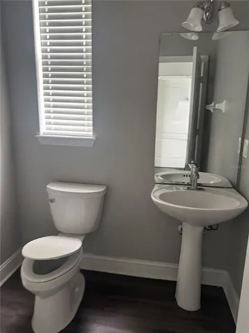 a bathroom with a sink and a toilet