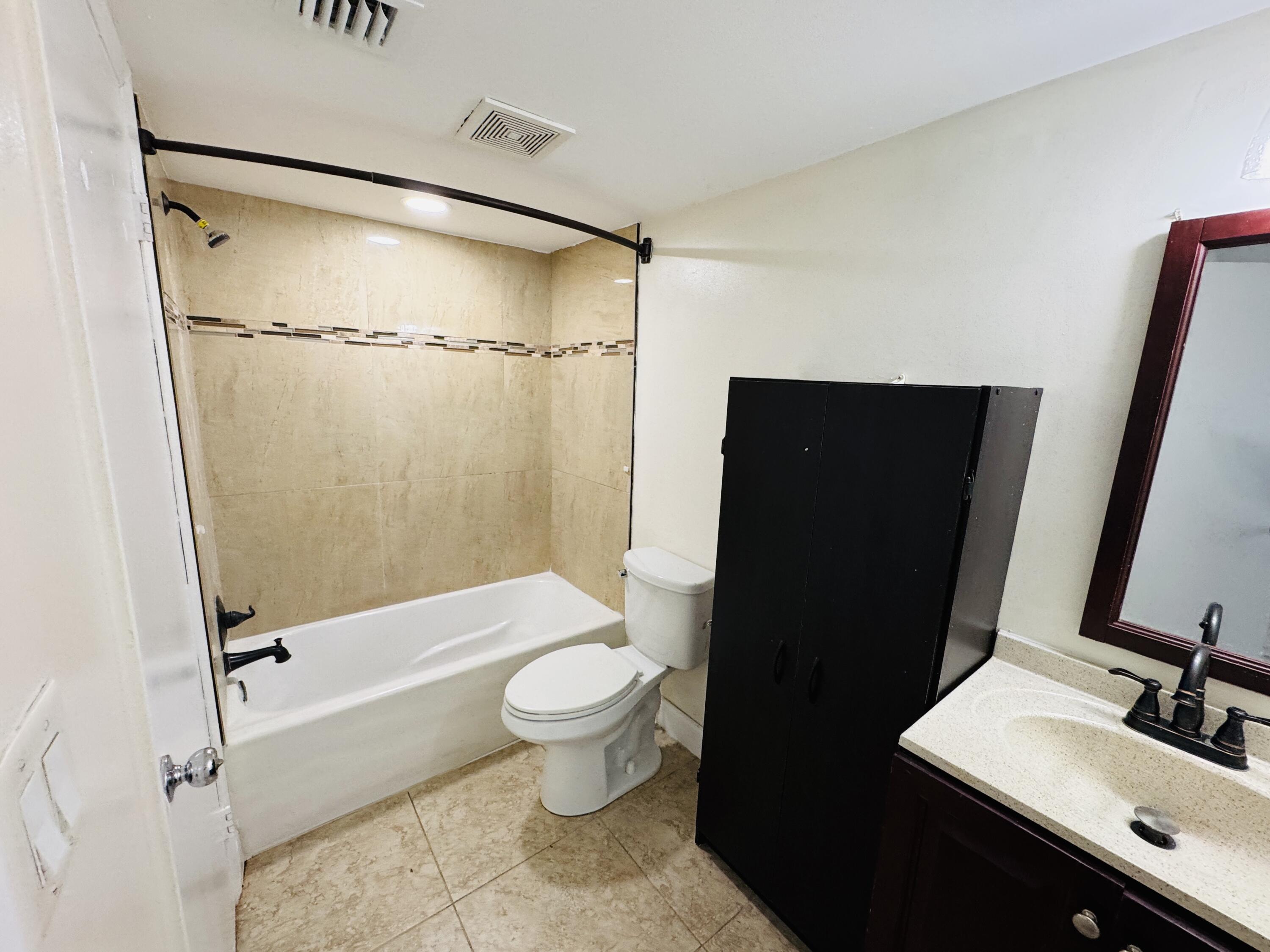 5686 Rock Island Road, Unit 115 Tamarac, FL 33319 - Photo 12 of 19 Photo Mar 04 2025, 4 30 44 PM