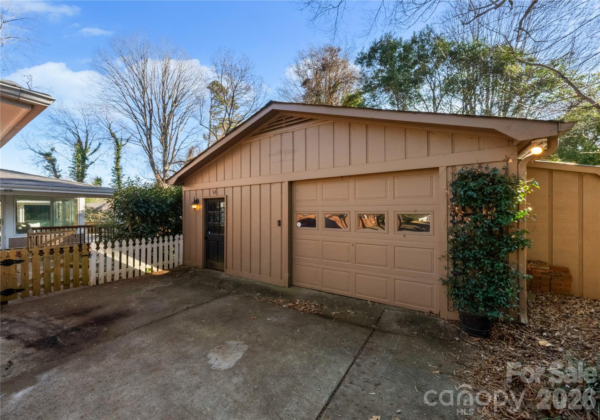 112 Sardis View Road Charlotte, NC 28211 - Photo 40 of 46 a view of a small house with wooden fence