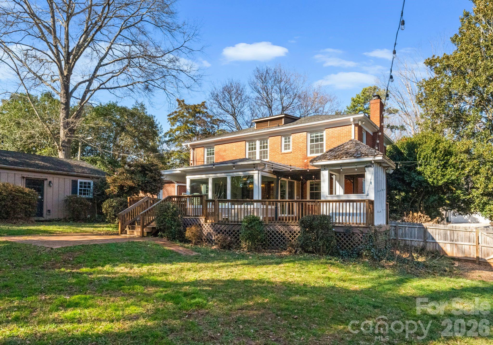 112 Sardis View Road Charlotte, NC 28211 - Photo 42 of 46 a front view of house with yard and green space