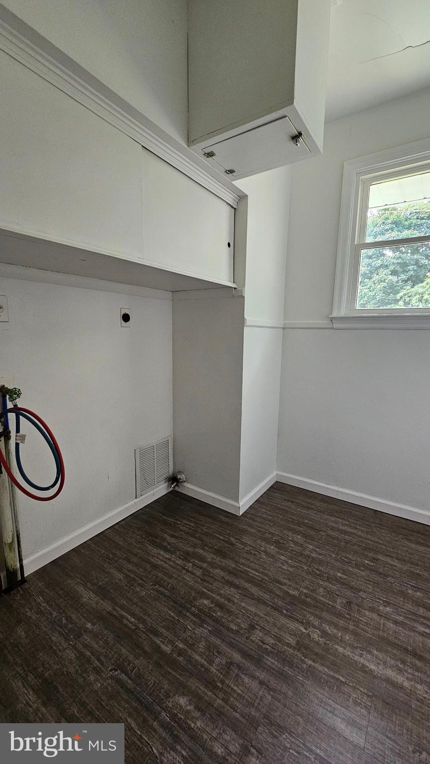 262 Roadstown Road Bridgeton, NJ 08302 - Photo 14 of 25 an empty room with wooden floor and windows