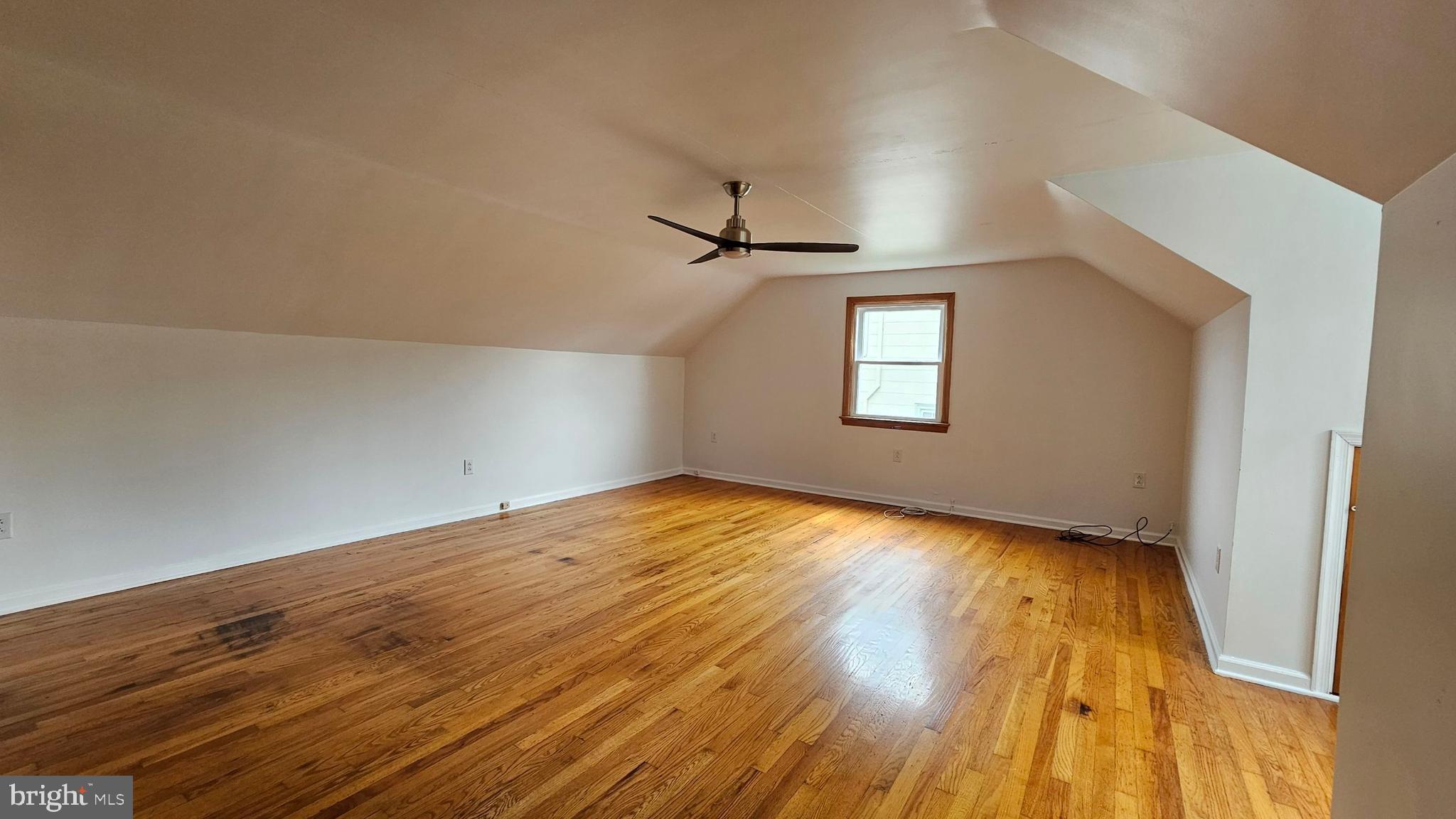 262 Roadstown Road Bridgeton, NJ 08302 - Photo 16 of 25 wooden floor in an empty room and window