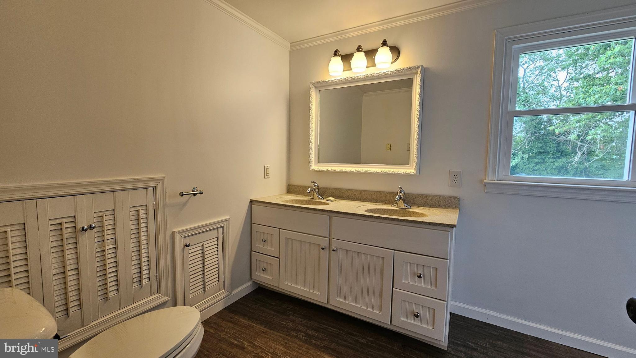 262 Roadstown Road Bridgeton, NJ 08302 - Photo 18 of 25 a bathroom with a toilet sink and mirror