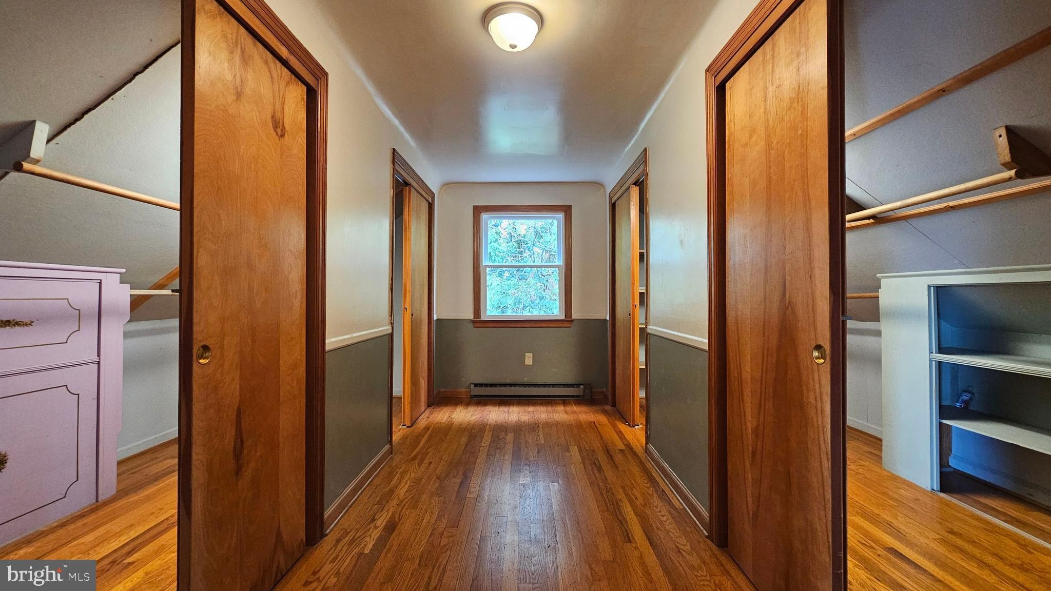 262 Roadstown Road Bridgeton, NJ 08302 - Photo 23 of 25 a view of a hallway with wooden floor and staircase