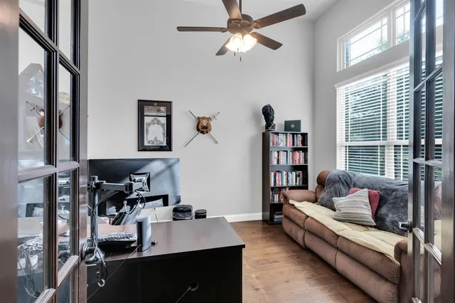 a living room with furniture and a window