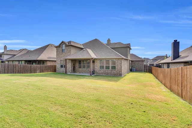 a view of a house with a swimming pool