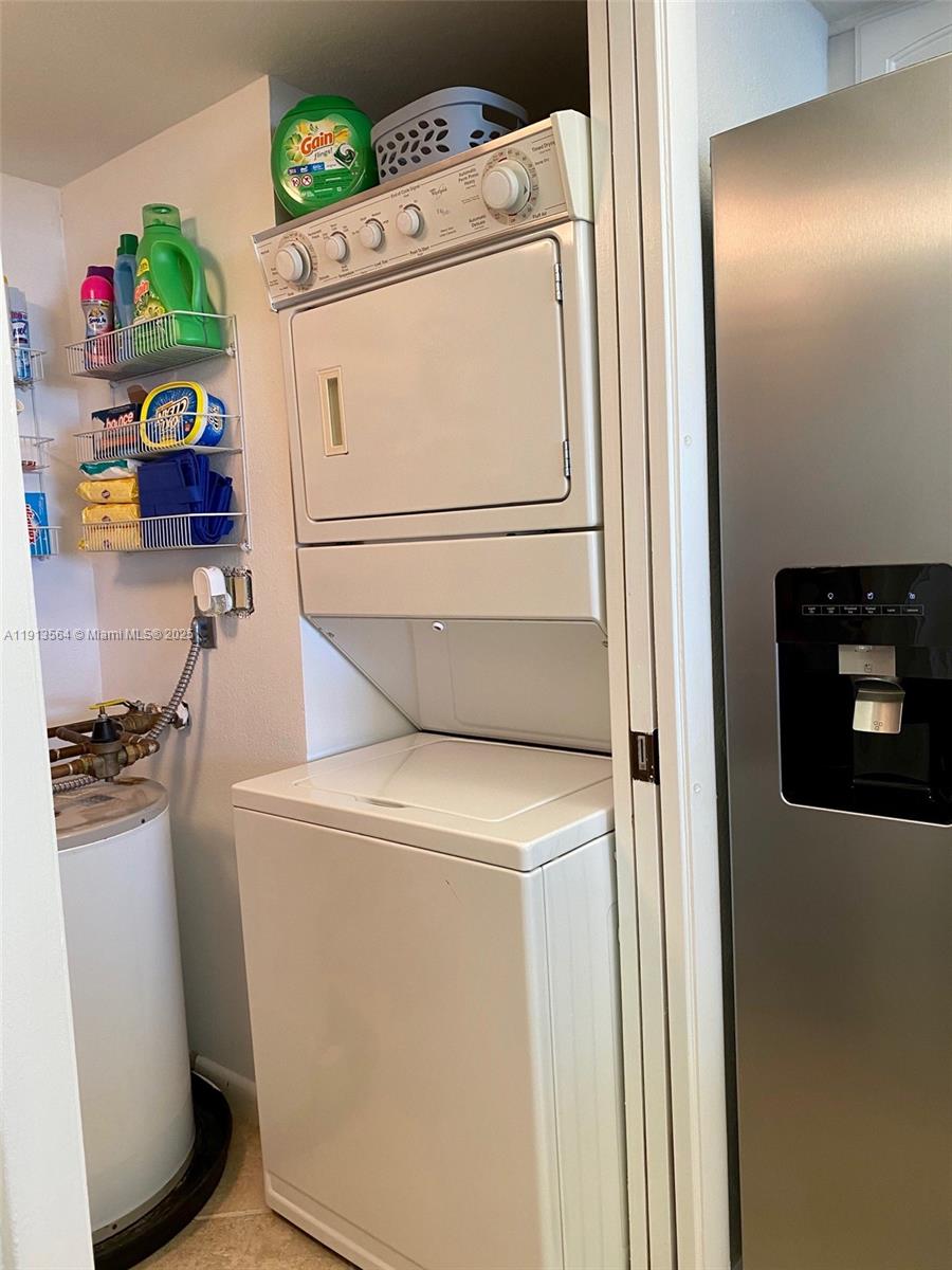 2800 North Hwy A1A, Unit 803 Fort Pierce, FL 34949 - Photo 20 of 35 a utility room with dryer and washer