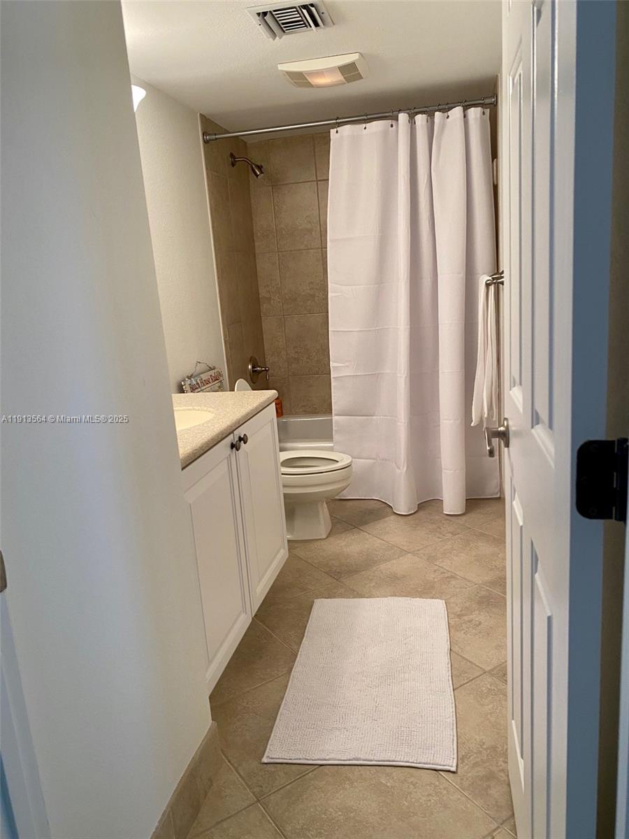 2800 North Hwy A1A, Unit 803 Fort Pierce, FL 34949 - Photo 21 of 35 a bathroom with a sink toilet and shower