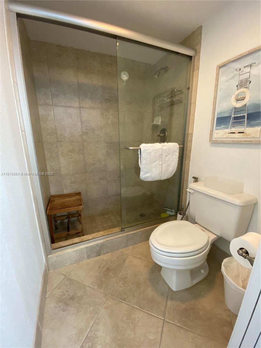 2800 North Hwy A1A, Unit 803 Fort Pierce, FL 34949 - Photo 25 of 35 a bathroom with a sink toilet and shower