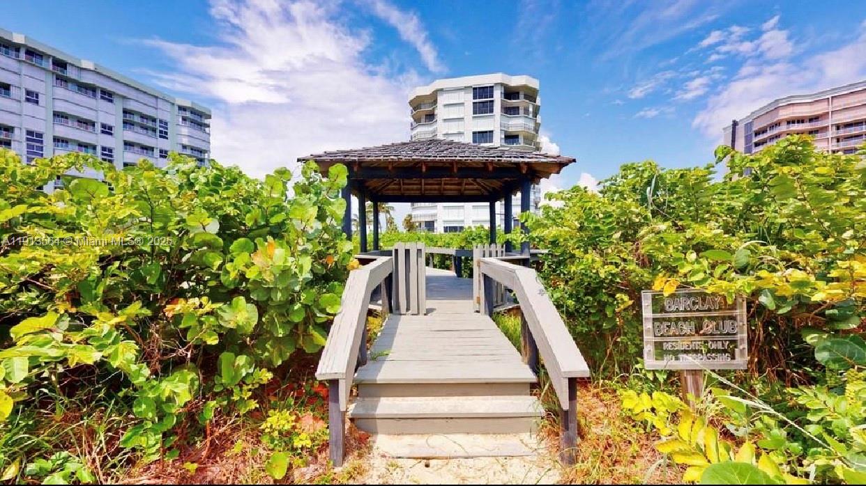 2800 North Hwy A1A, Unit 803 Fort Pierce, FL 34949 - Photo 27 of 35 a view of building with yard