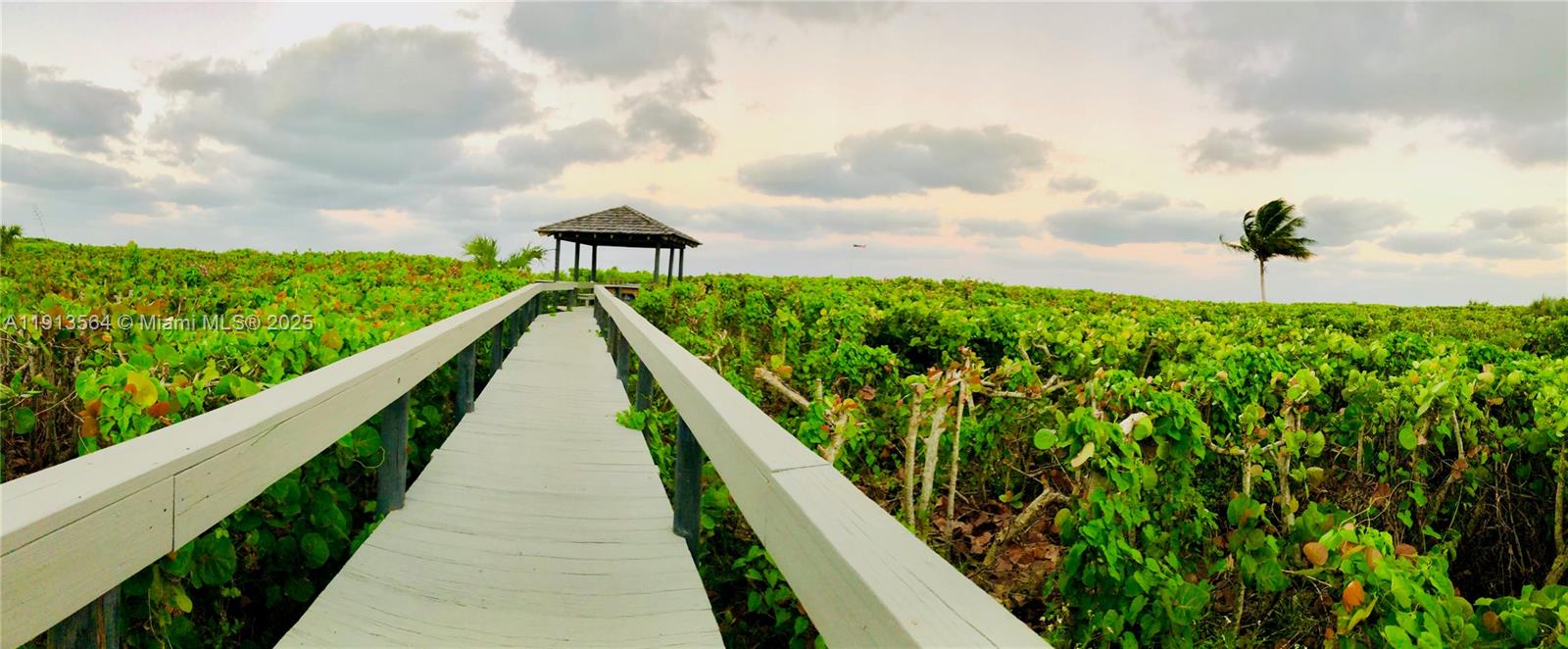 2800 North Hwy A1A, Unit 803 Fort Pierce, FL 34949 - Photo 28 of 35 a view of a garden with a slide