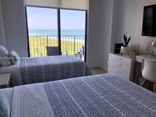 a kitchen with stainless steel appliances granite countertop a stove a refrigerator and a microwave