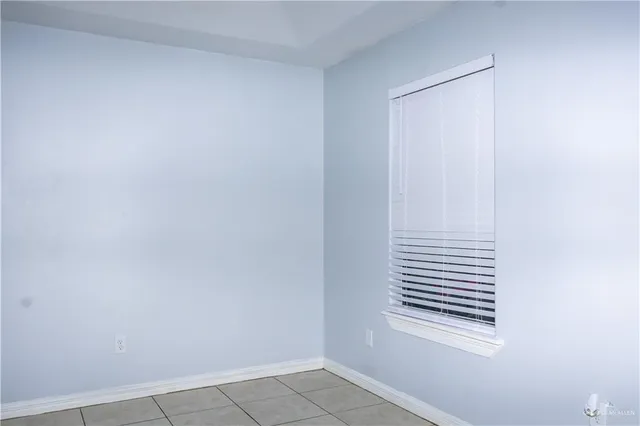 a view of a room that has a window in it