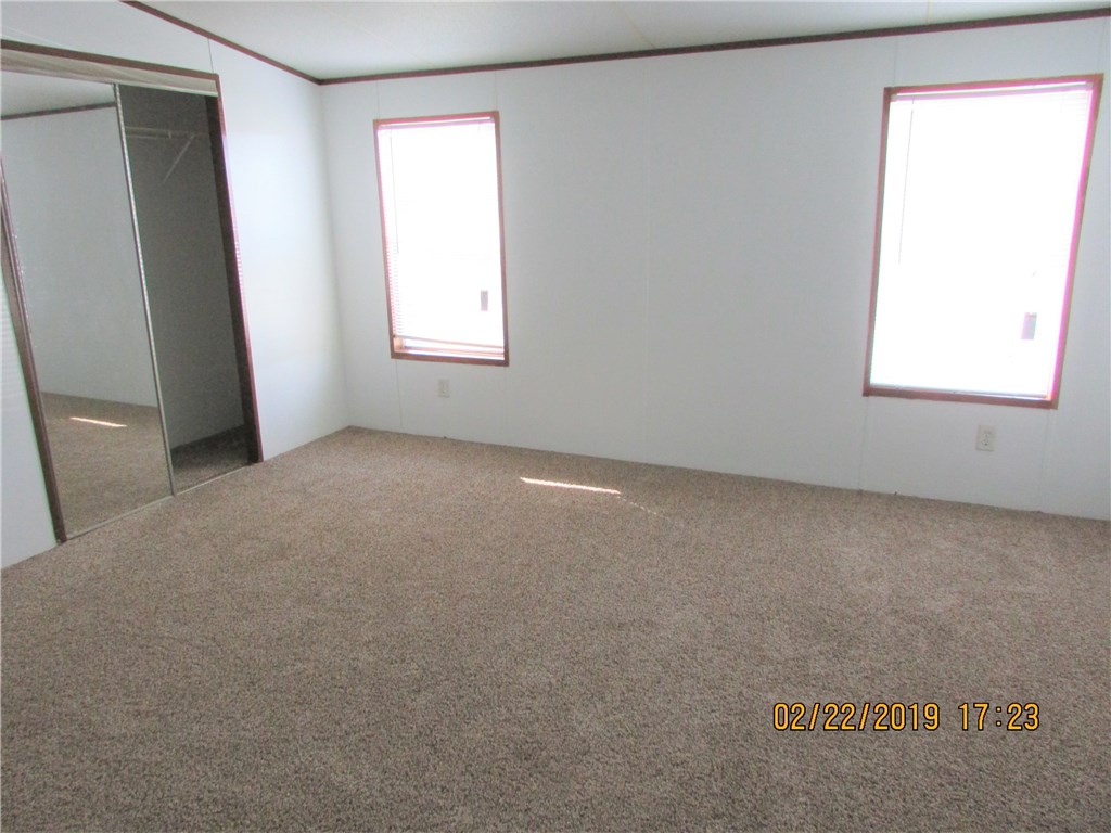 371673 Kings Ferry Road Hilliard, FL 32046 - Photo 13 of 34 an empty room with windows