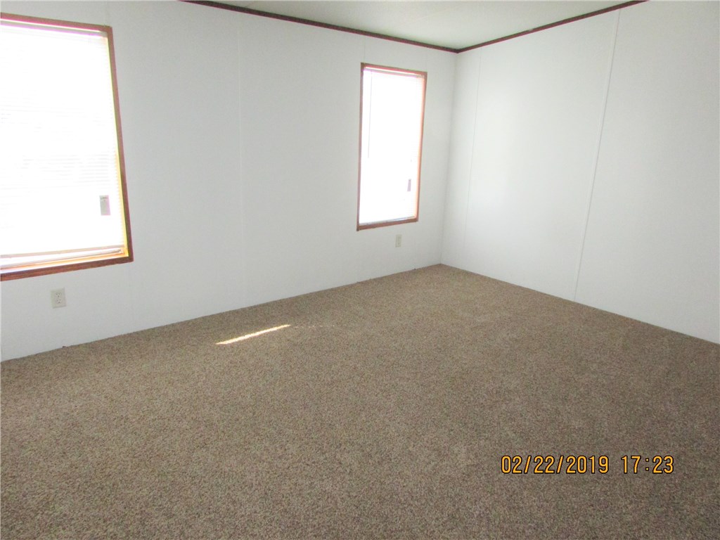 371673 Kings Ferry Road Hilliard, FL 32046 - Photo 14 of 34 an empty room with a window