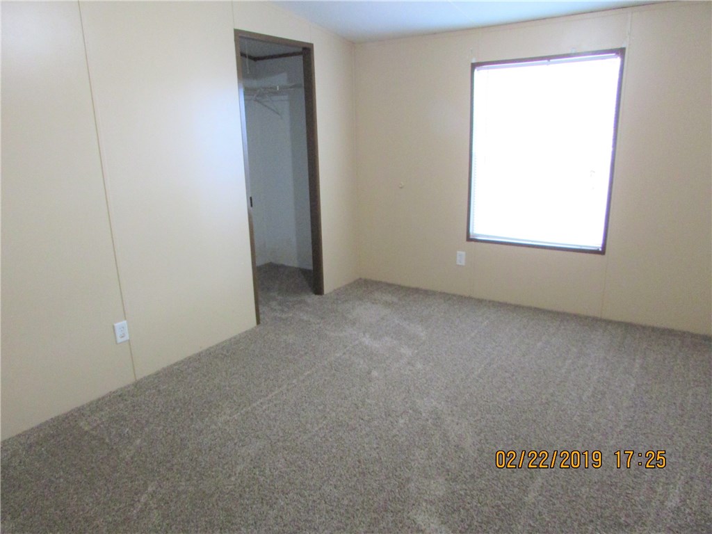 371673 Kings Ferry Road Hilliard, FL 32046 - Photo 17 of 34 an empty room with a window