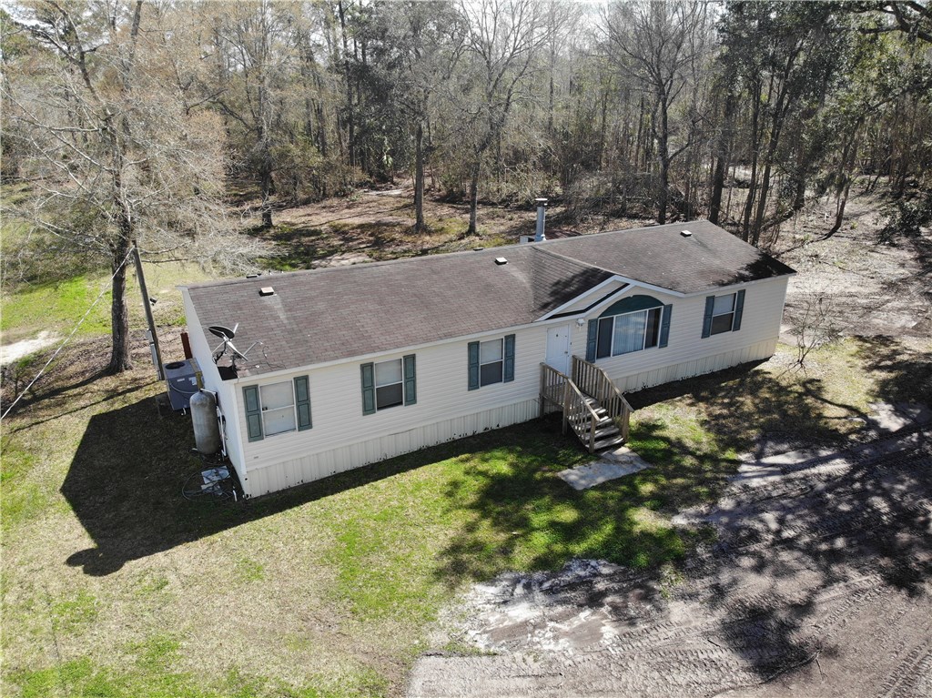 371673 Kings Ferry Road Hilliard, FL 32046 - Photo 19 of 34 a aerial view of a house with a yard