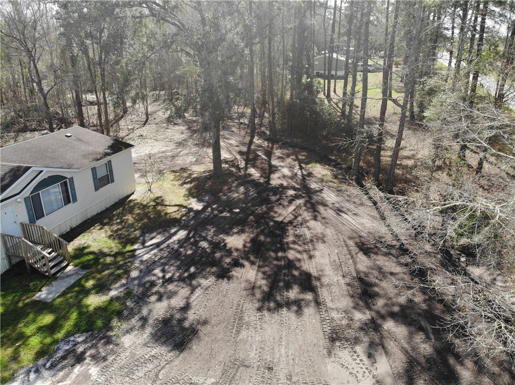 371673 Kings Ferry Road Hilliard, FL 32046 - Photo 20 of 34 a view of houses with yard
