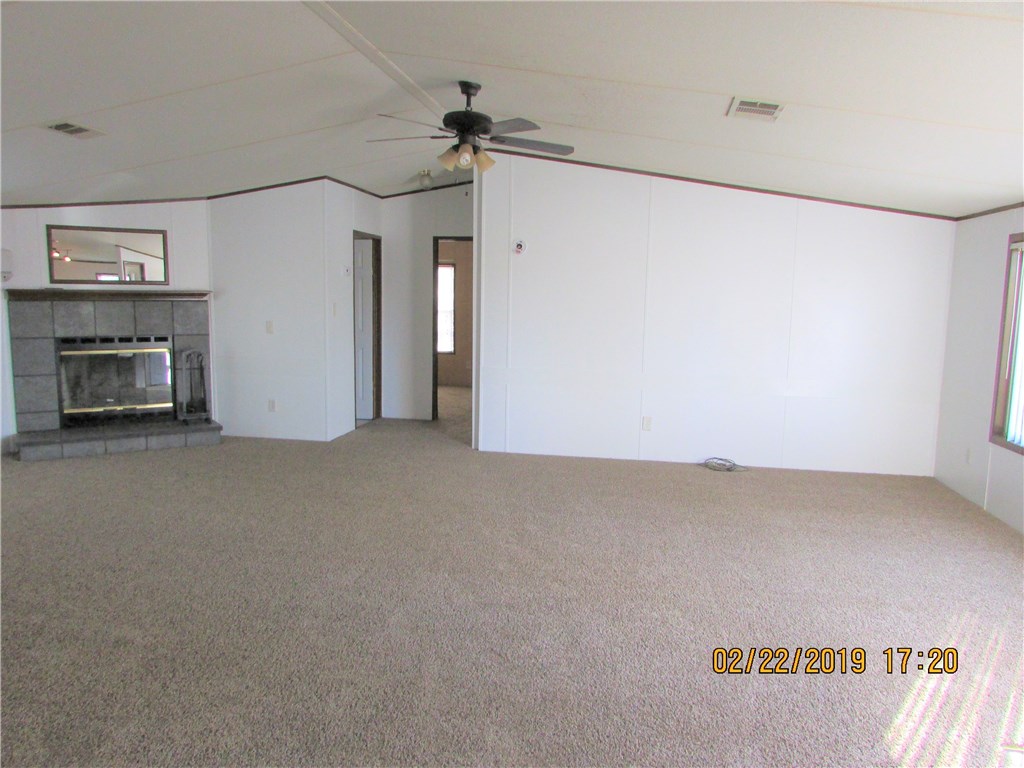 371673 Kings Ferry Road Hilliard, FL 32046 - Photo 2 of 34 a view of empty room with fireplace