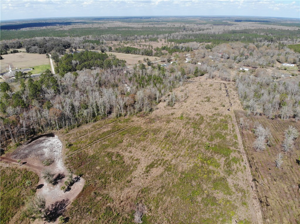 371673 Kings Ferry Road Hilliard, FL 32046 - Photo 23 of 34 a view of a field with an ocean