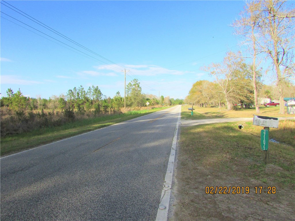 371673 Kings Ferry Road Hilliard, FL 32046 - Photo 33 of 34 a view of a road with an ocean view