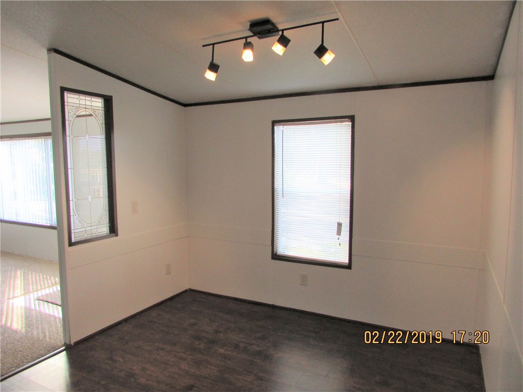 371673 Kings Ferry Road Hilliard, FL 32046 - Photo 7 of 34 an empty room with windows