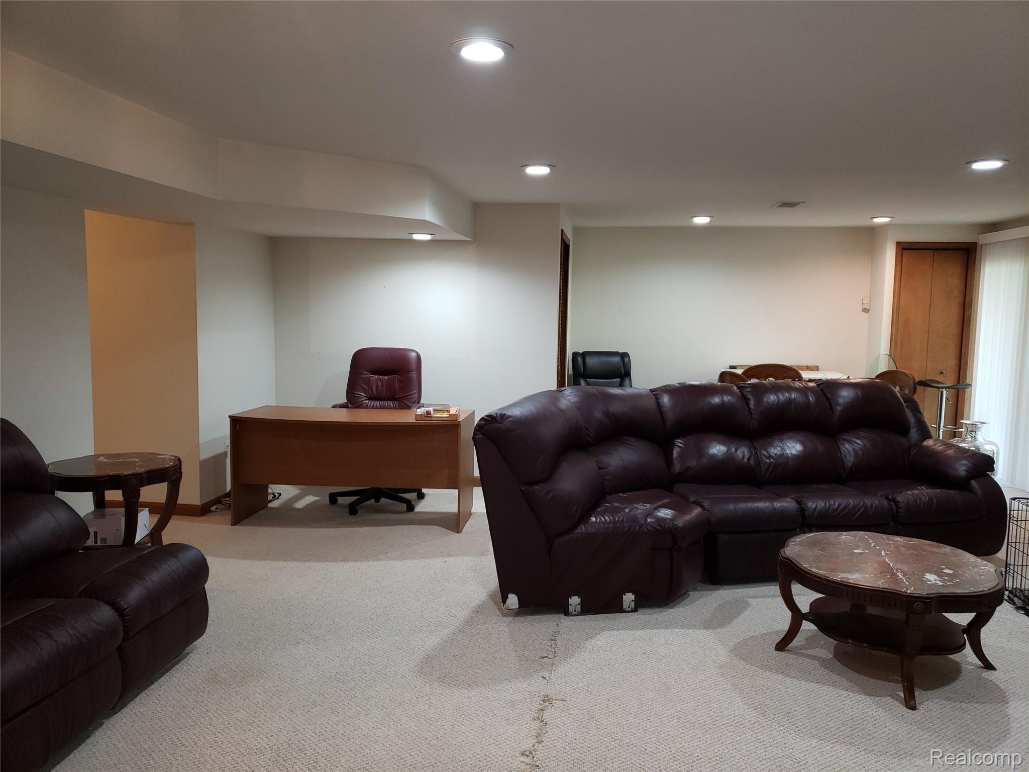 21970 River Ridge Trail, Unit 72 Farmington, MI 48335 - Photo 29 of 38 Family Room Lower Level 3