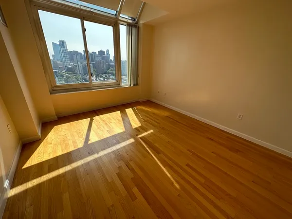 a view of balcony and wooden floor